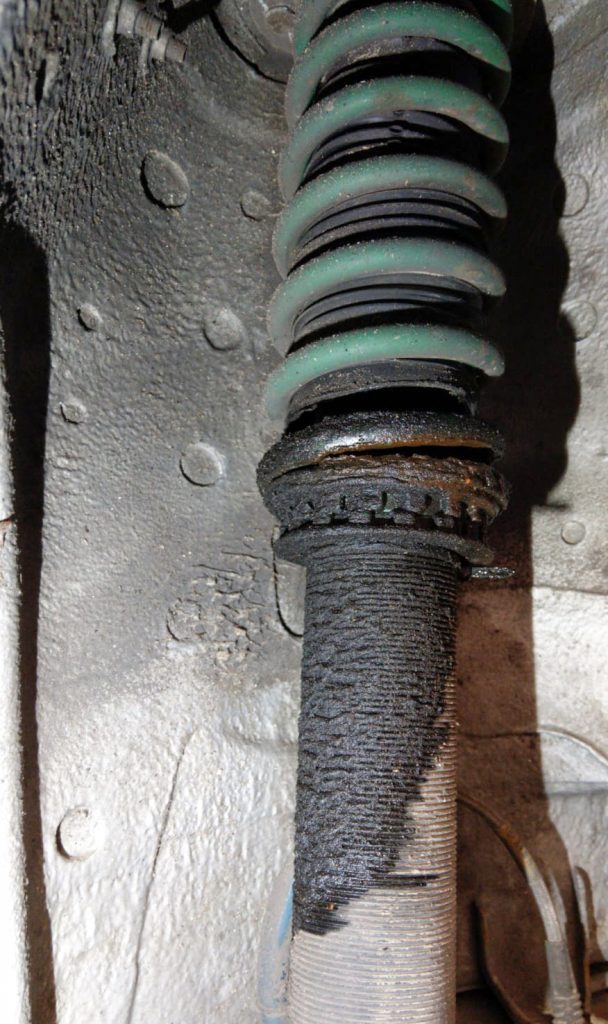 coilover suspension leaking fluid